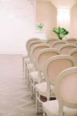 blurred background of row of beautiful chairs on a holiday