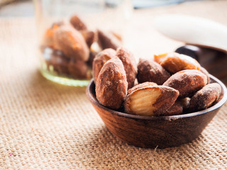 almond nut in a bowl on wooden table