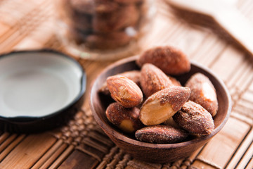 almond nut in a bowl on wooden table