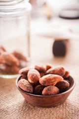 almond nut in a bowl on wooden table