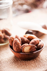almond nut in a bowl on wooden table
