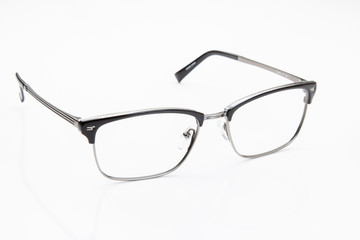 Eyeglasses metal frames for men, black and silver on white background.