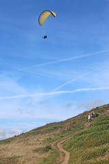 Paraglider flying above Newgale Bay