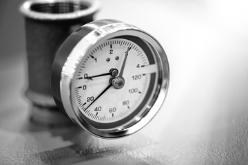 The pressure from the compressor