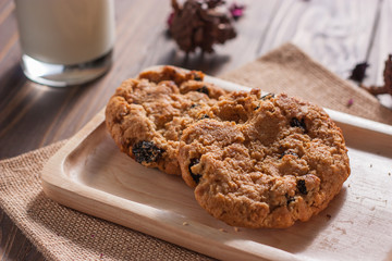 Daily homemade Cookies and milk on wood board