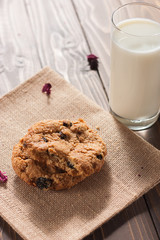 Daily homemade Cookies and milk on wood board