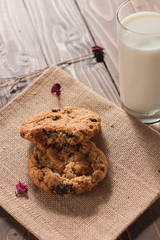 Daily homemade Cookies and milk on wood board