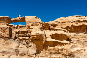 Fototapeta premium Panoramic view of the Wadi Rum desert, Jordan. Blue sky at summer time.