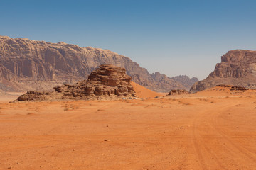 Fototapeta na wymiar Panoramic view of the Wadi Rum desert, Jordan. Blue sky at summer time.