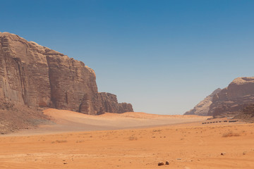 Panoramic view of the Wadi Rum desert, Jordan. Blue sky at summer time.
