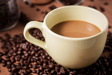 image of coffee cup on wood
