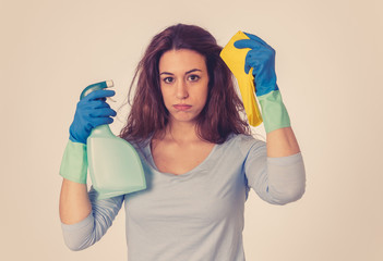 Attractive red haired woman bored and restless of cleaning and housekeeping