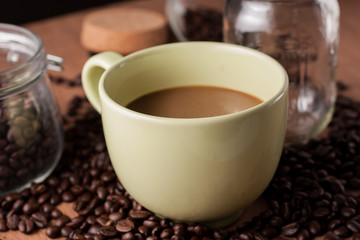 image of coffee cup on wood background