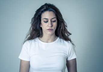 Fototapeta premium Portrait of sad and depressed woman feeling upset and distressed. Human expressions and emotions