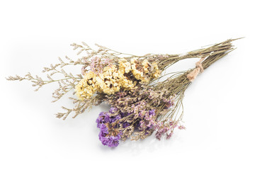 Bouquet of dried flowers on white