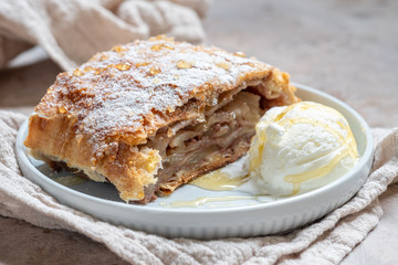 Sweet apple strudel with vanilla ice cream