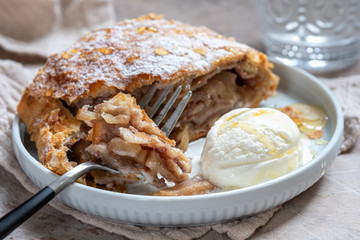 Sweet apple strudel with vanilla ice cream