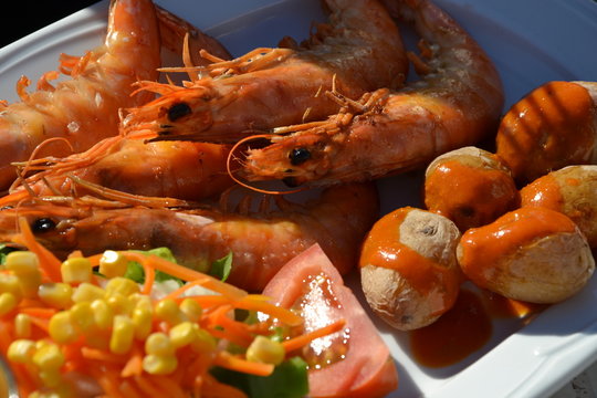 Delicious seafood with potatoes and mojo picon sauce. Fuerteventura, Canary Island, Spain.