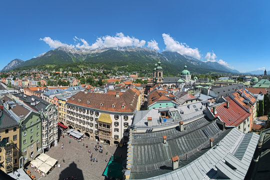 Innsbruck, Austria. Panoramic view over the central, north-western and northern parts of the city with mountains of Karwendel mountain range in the background. View from the tower of the Old Town Hall