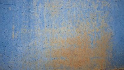 Fototapeta premium Rusty blue metal wall texture background, old sheet of iron covered with rust and blue color.