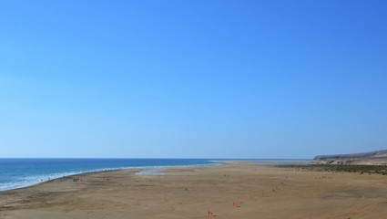 Panoramic view on famous, wide beach Playa de Sotavento, Canary Islands, Fuerteventura, Spain. One of the best windsurfing beaches in the world