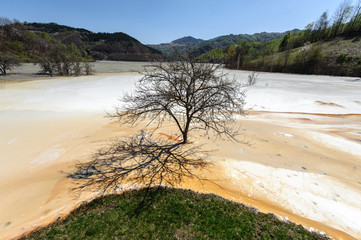 Pollution of a lake with contaminated water from a gold mine in Roșia Montană, Romania.