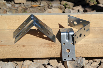 Mounting angle bracket for fixing the wooden frame close-up