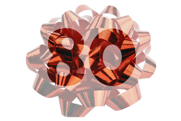 Number 80 highlighted in front of a closeup. Photograph of a red gift bow