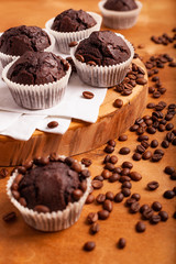 Several chocolate muffins on the table