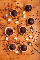 Several chocolate muffins on the table