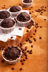 Several chocolate muffins on the table