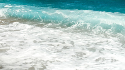 Naklejka na ściany i meble Beautiful image of rolling sea waves. Turquoise ocean sea tides