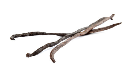 Dried aromatic vanilla sticks on white background