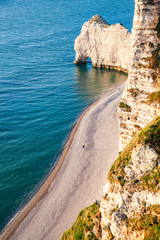 coastal landscape along the Falaise d'Aval the famous white cliffs of Etretat village, Normandie, France