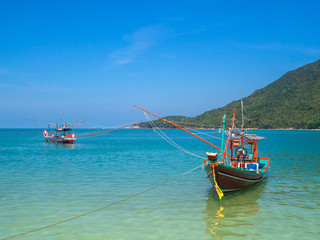 Fishing boats off the coast of the island of Koh Phangan. Thailand