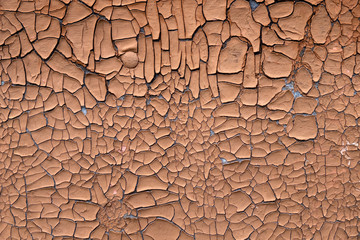 Background in the form of cracked from time paint brown