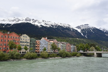 Fototapeta na wymiar River with colourful houses in Innsbruck 