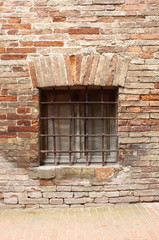 Medieval window with grate