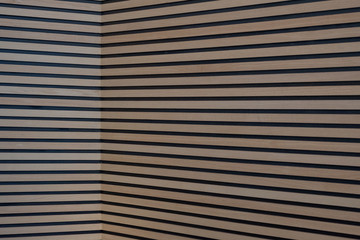 Interior wall cladding made from strips of plywood