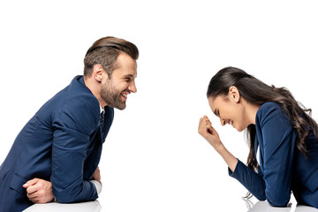 businessman and businesswoman in formal wear laughing isolated on white