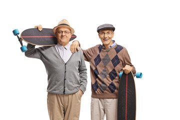 Two cheerful seniors with longboards