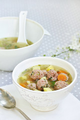 Italian Wedding Meatball Soup. soup in a beautiful white bowl