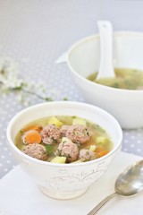 Italian Wedding Meatball Soup. soup in a beautiful white bowl
