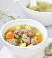 Italian Wedding Meatball Soup. soup in a beautiful white bowl