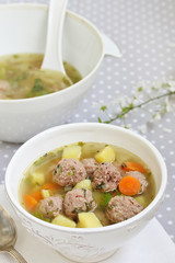 Italian Wedding Meatball Soup. soup in a beautiful white bowl