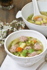 Italian Wedding Meatball Soup. soup in a beautiful white bowl