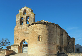 Fototapeta na wymiar Church of the Nativity of Our Lady in the town of Arcas, in Cuenca, Spain. Romanesque cover with five archivolts. 13th century.