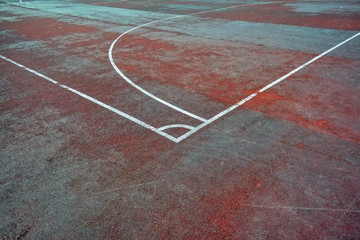 Artificial sports field with white lines markings close-up.