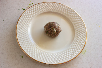 Meat meatballs on a plate. Meat meatballs on a white plate. Meat balls on a white background