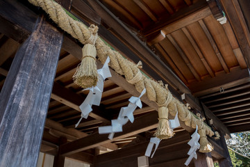 Sacred string on the japanese temple entrance